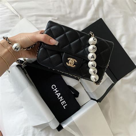 chanel gold chain handbag|chanel bag with pearl chain.